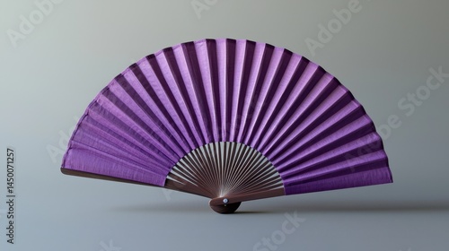 Color hand fan isolated on gray background. Open folding fan for mock-up