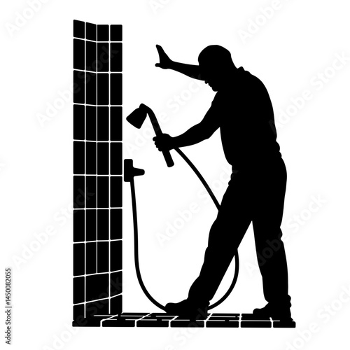 Silhouette of a worker cleaning shower tiles, home renovation concept