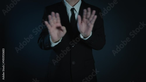 Businessman making a no gesture hand gestures