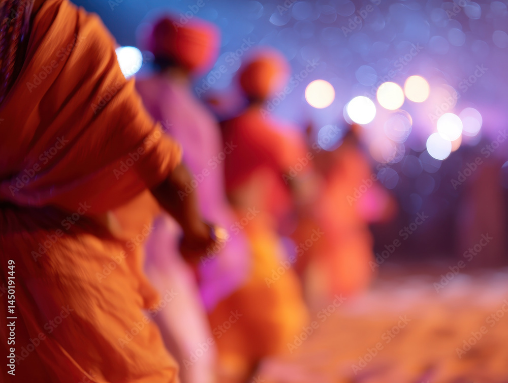 Naklejka premium Vibrant cultural dance with colorful attire and blurred lights
