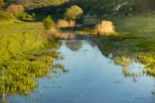 Obraz na płótnie Beautiful landscape with the Raut River in the Republic of Moldova. rural nature in Eastern Europe. w salonie