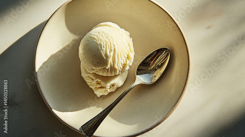 Vanilla ice cream on a beige plate close-up. Aesthetic ice cream photo