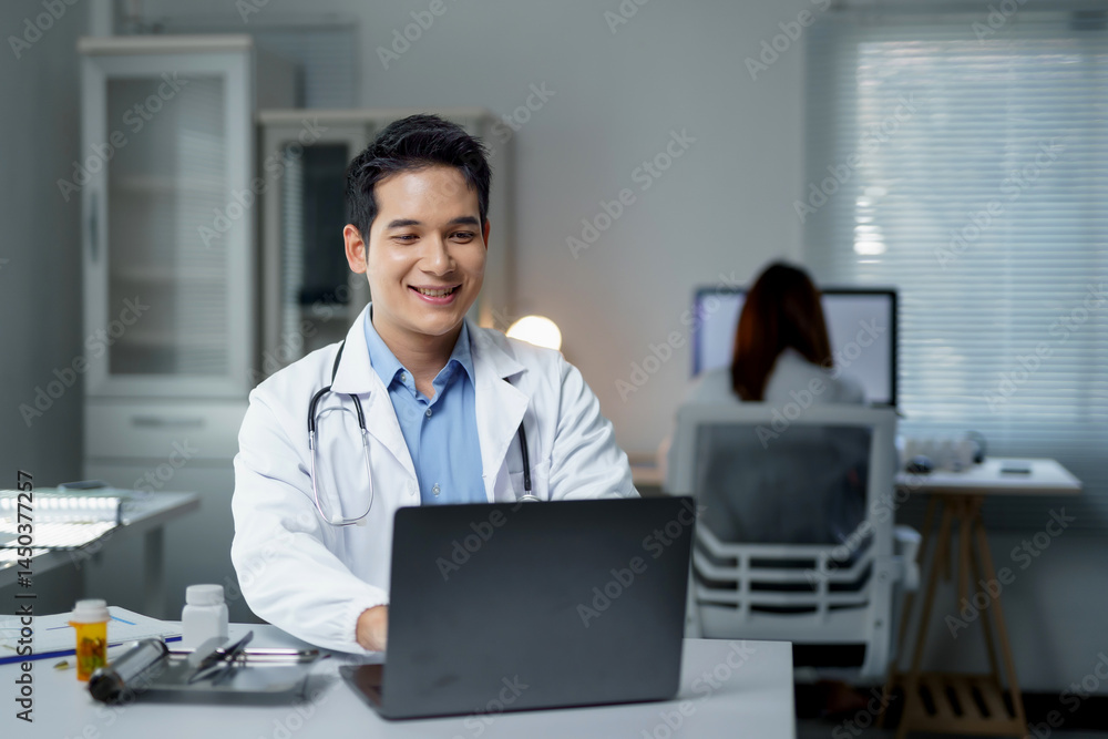 Asian doctor working on patient medical records using a laptop in a bright, modern clinic, demonstrating professionalism and care Asian doctor working on patient medical records using a laptop in a bright, modern clinic, demonstrating professionalism and care