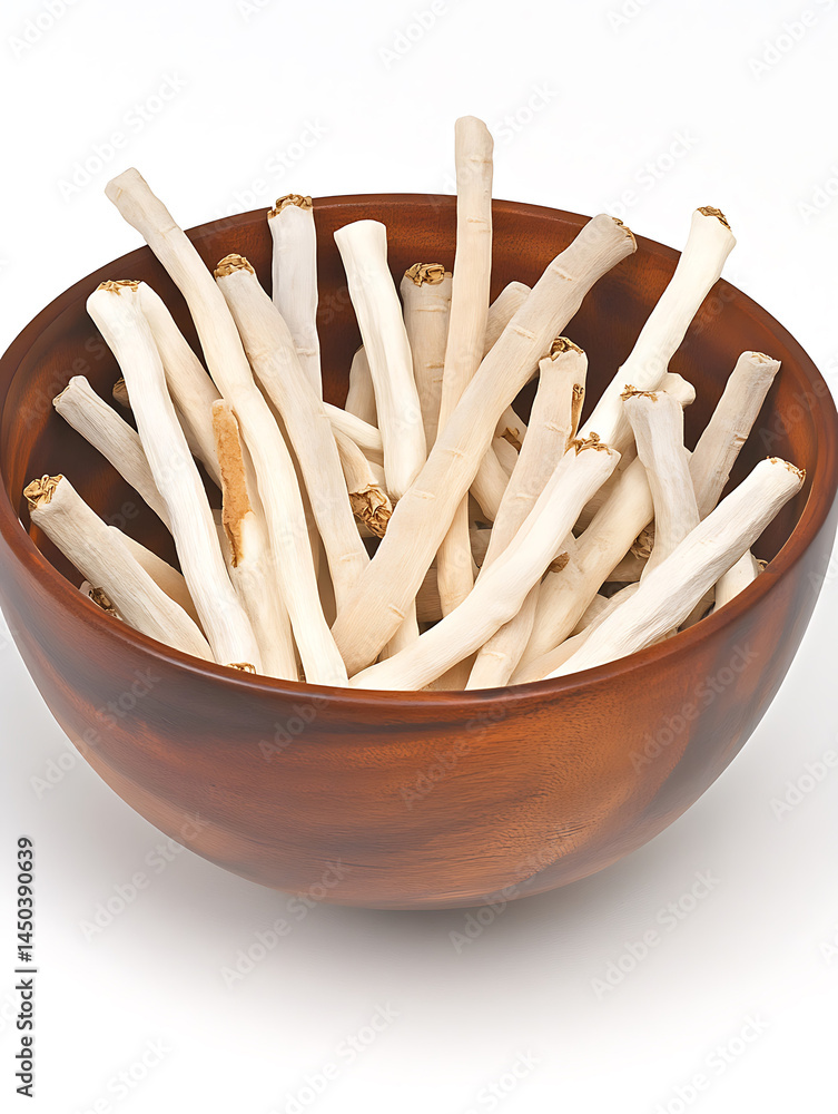 A wooden bowl overflowing with light-colored stick-like textured treats with brown ends.