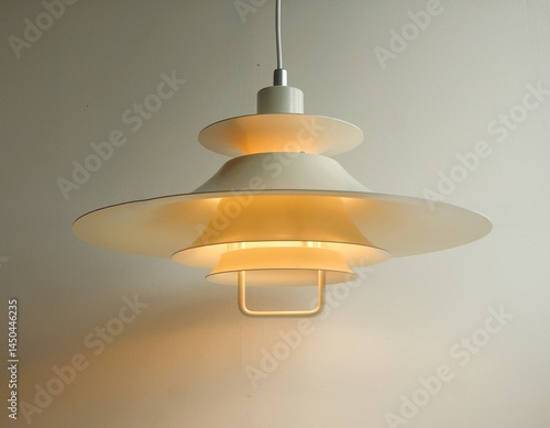 White lamp on a white background. Mid century modern style with multi layer design.