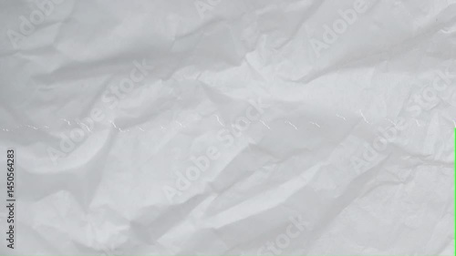 Paper Tear Animation open on a green screen, creating a transition with a key color