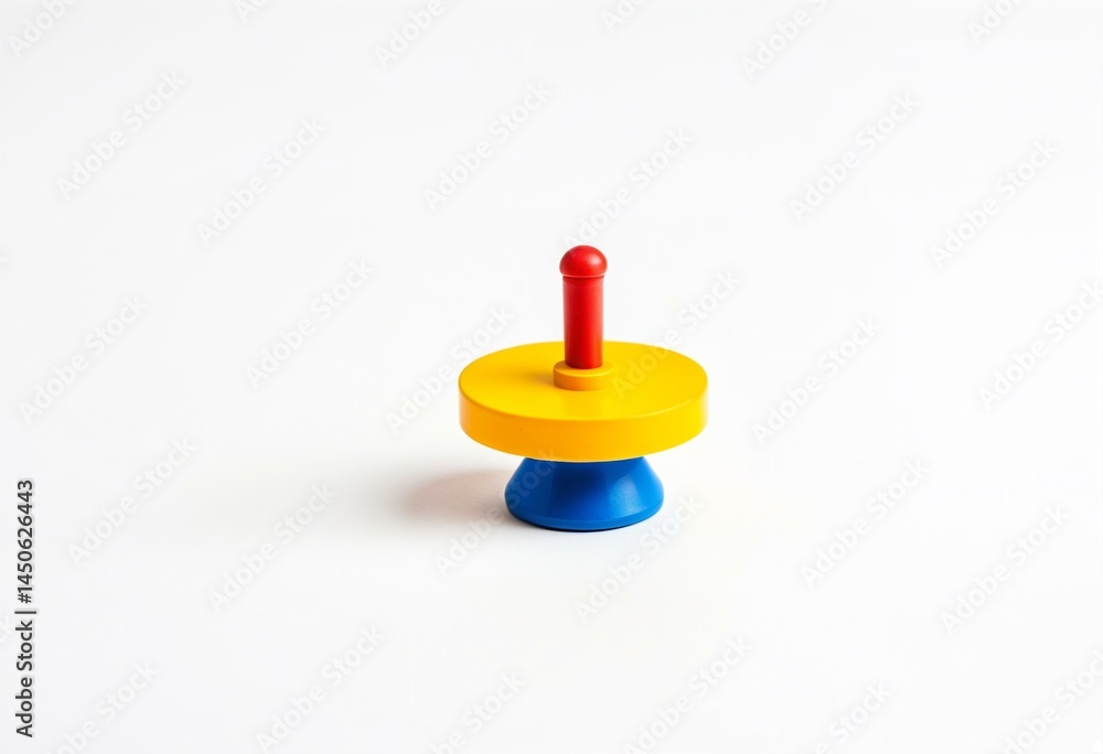 A stack of colorful plastic toys on a white surface. A stack of colorful plastic toys on a white surface.
