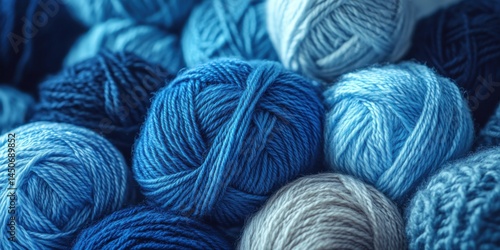 Various shades of blue yarn balls for knitting texture