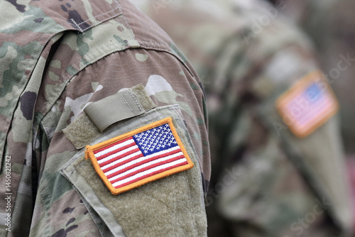 US soldiers. US army. USA patch flag on the US military uniform. United States Armed Forces. Veterans Day.