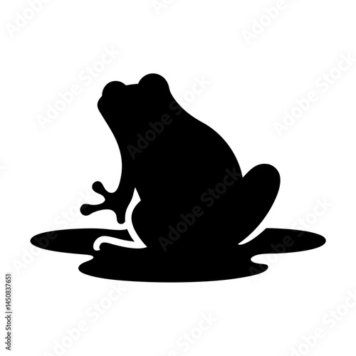 Silhouette of a frog sitting in water, casting a dark shadow