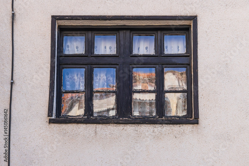 Obraz na płótnie Reflections in a window in the old town of Ohrid. w salonie