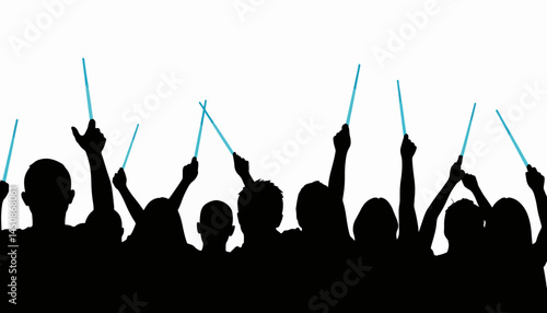 Energetic fans cheering with glow sticks at a concert, vibrant excitement