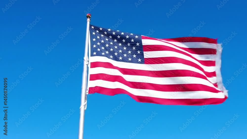 High-resolution American flag against bright blue sky. Proud US flag waving in vivid red, white, and blue. Patriotic Stars and Stripes fully unfurled under clear sky. High-resolution American flag against bright blue sky. Proud US flag waving in vivid red, white, and blue. Patriotic Stars and Stripes fully unfurled under clear sky.