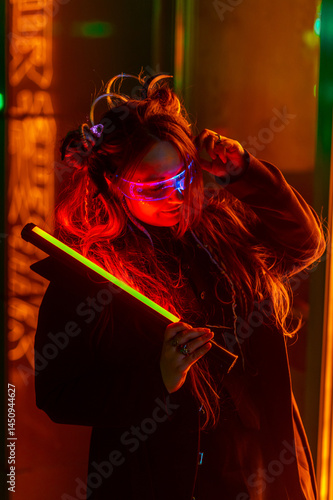 Cyberpunk girl against the neon background of a night city