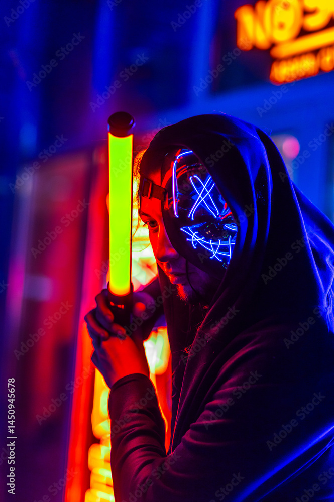 Cyberpunk man against neon background of night city