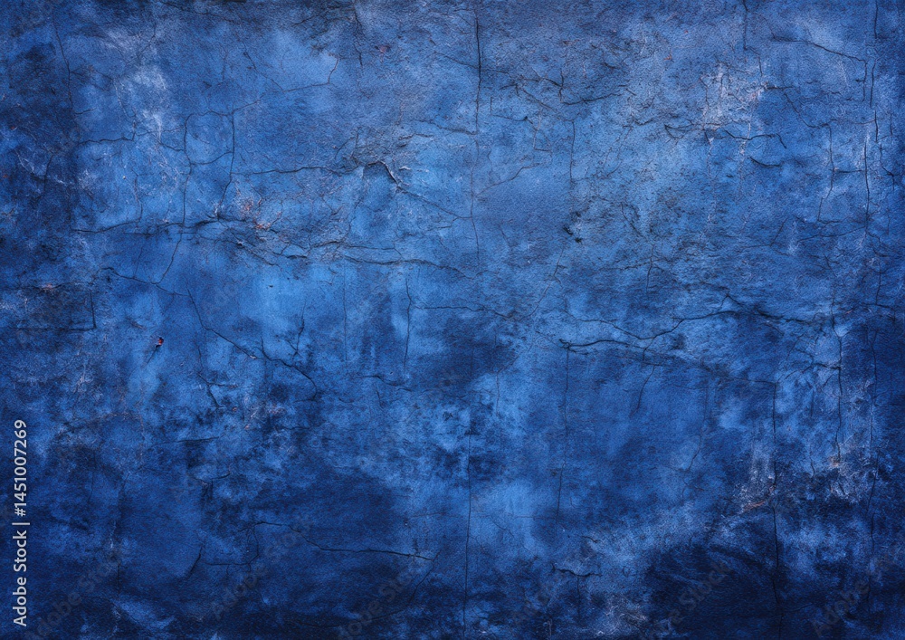 Obraz premium Abstract textured blue wall with cracks.