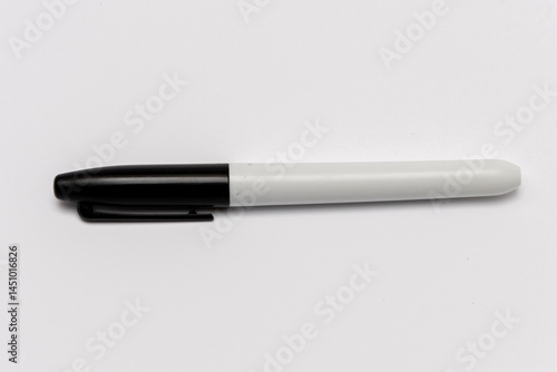 A plain black marker for writing and drawing, isolated on a white background.