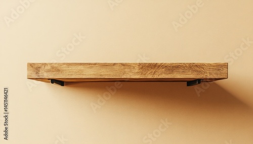 Close-up of a wooden shelf mounted on a wall with black brackets showcasing texture details