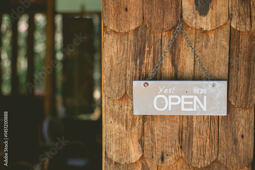 do not disturb sign on wooden door
