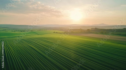 clean energy concept, Sunrise over lush green fields rural landscape aerial photography serene environment nature's beauty concept