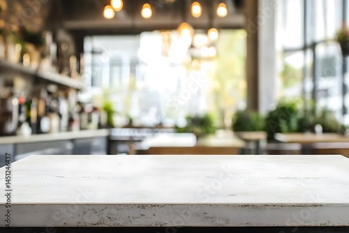 White marbel table in coffee shop blur background with bokeh