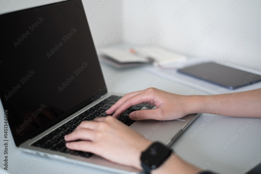 Close-up hand typing on keyboard laptop computer business technology online working desk office concept Close-up hand typing on keyboard laptop computer business technology online working desk office concept