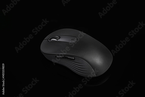 Computer mouse on dark background