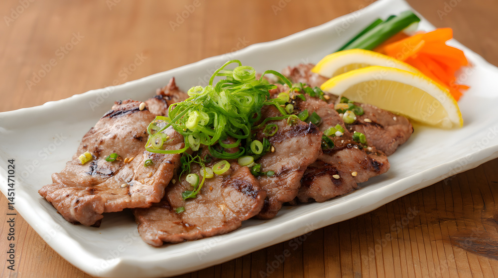 Delicious Thinly Sliced Grilled Beef Tongue with Green Onions and Citrus Garnish on a White Plate Delicious Thinly Sliced Grilled Beef Tongue with Green Onions and Citrus Garnish on a White Plate