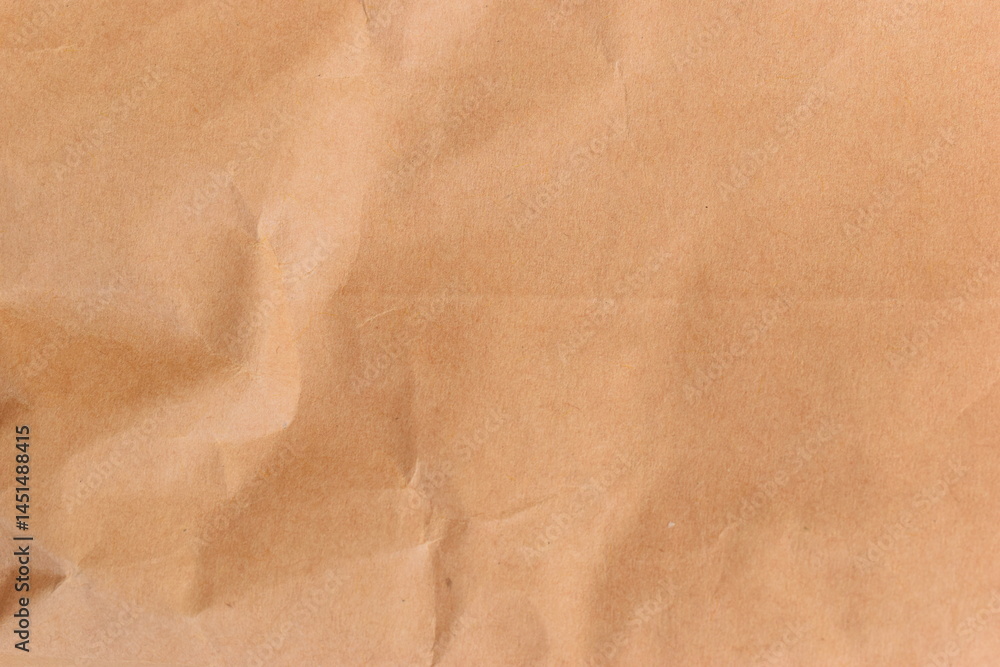 Fototapeta premium crease brown paper texture background, recycle material