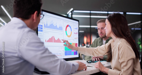 Businesswoman Managing Company Data Using Analytics Dashboard