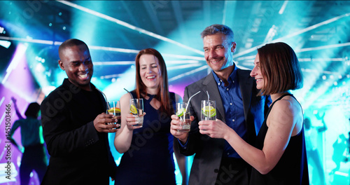 Multiracial Group Of Friends Cheers With Champagne