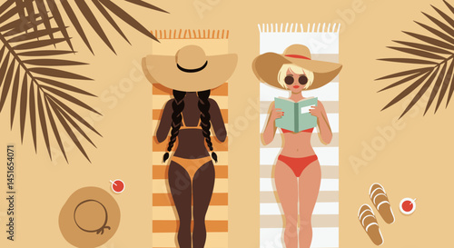 Two women relaxing in beach hats while sunbathing on towels  