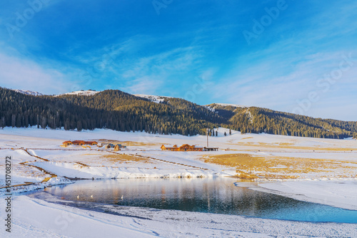 Tianshan Mountains, Lake Sayram, and Swans in Winter in Xinjiang, China on March 11, 2024