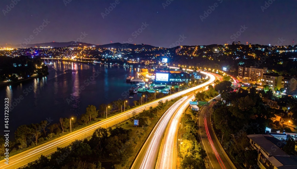 Fototapeta premium Urban nightscape riverfront city aerial photography bustling setting city lights modern life