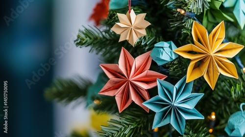 Festive origami star ornaments adorning a small christmas tree.