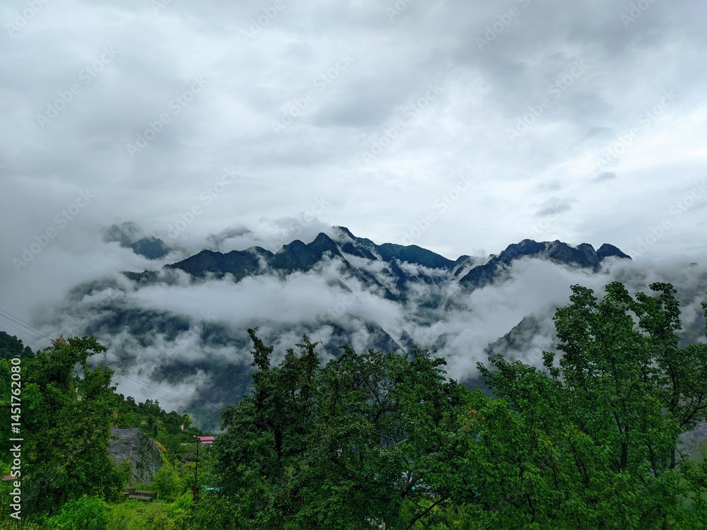 Joshimath Himalayas in Fog: Serene Mountain Valley Scene Joshimath Himalayas in Fog: Serene Mountain Valley Scene