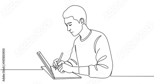 Young man sketching with digital tablet in minimalist workspace  