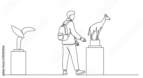 Person admiring statue of a goat in an art museum  