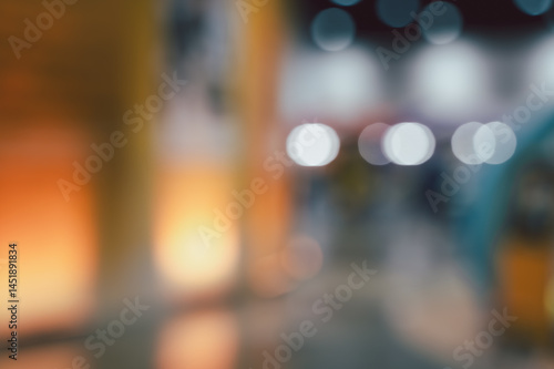 Blurred abstract background with warm orange and cool blue tones and bokeh