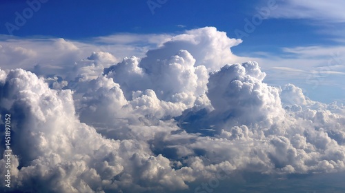 Bright Cumulus Clouds Stretching Across Endless Blue Sky