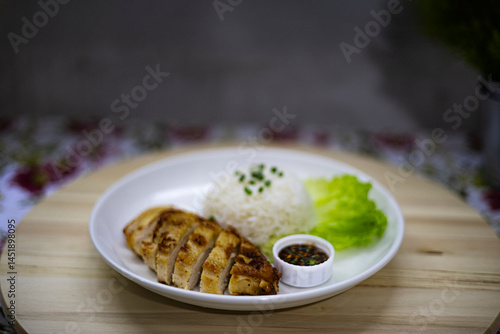 Billede på lærred Grilled Chicken Breast With Rice On The Table