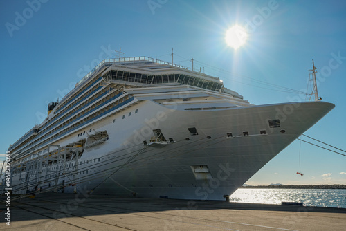 Obraz na płótnie Mega family cruiseship cruise ship liner Fortuna docked at terminal in Marseille Provence, France during breathtaking sunset sunrise twilight blue hour dusk dawn silhouette scenic panorama w salonie