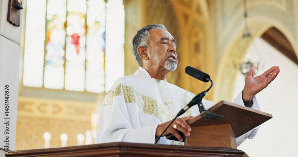 Christianity, pastor and praying in church, belief and preaching with microphone for faith or gospel. Podium, preacher and mature man with speech for religion, Easter service or sermon to worship God