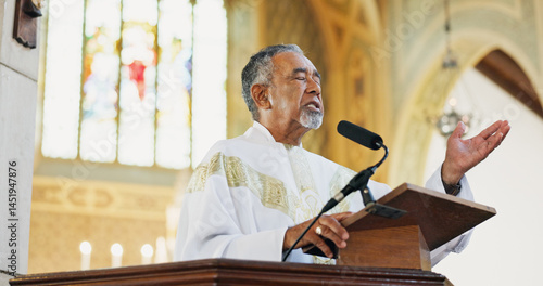 Obraz na płótnie Christianity, pastor and praying in church, belief and preaching with microphone for faith or gospel. Podium, preacher and mature man with speech for religion, Easter service or sermon to worship God w salonie