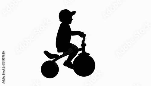 Joyful child riding tricycle silhouette, playful imagination