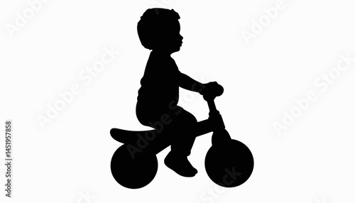 Toddler enjoying playtime on tricycle silhouette, childhood joy