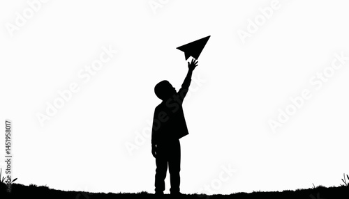 Boy joyfully flying a paper airplane in silhouette, childhood dreams