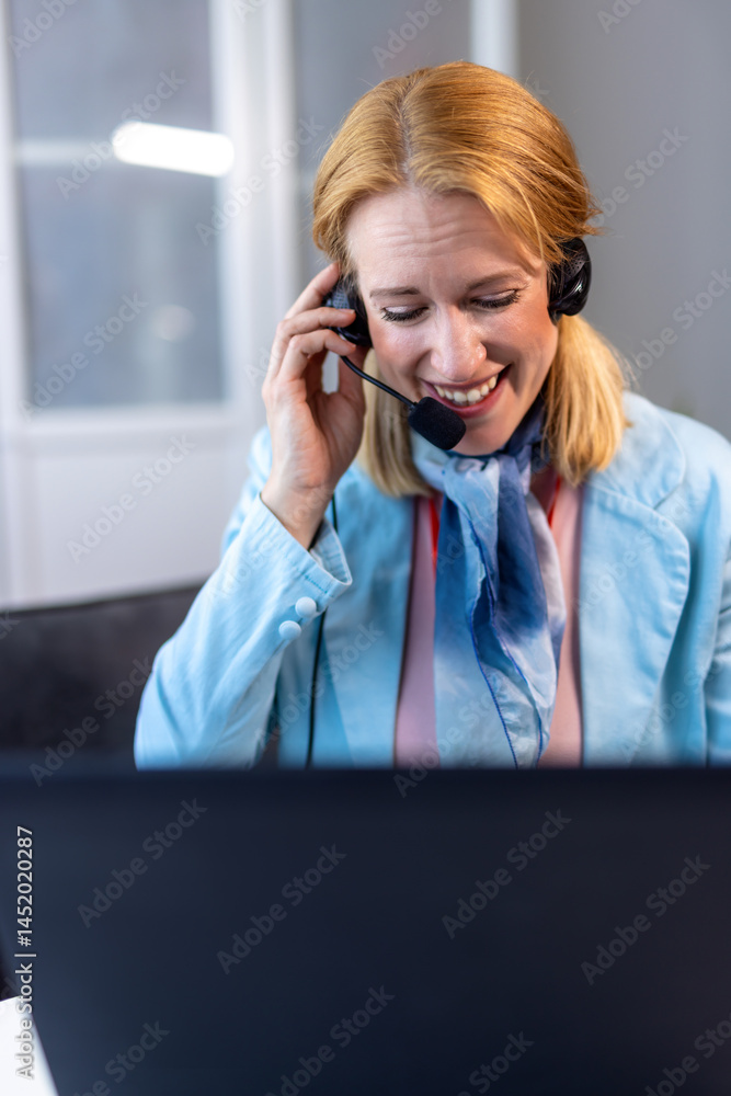 Remote work: woman using a laptop and headset for virtual meetings. Remote work: woman using a laptop and headset for virtual meetings.