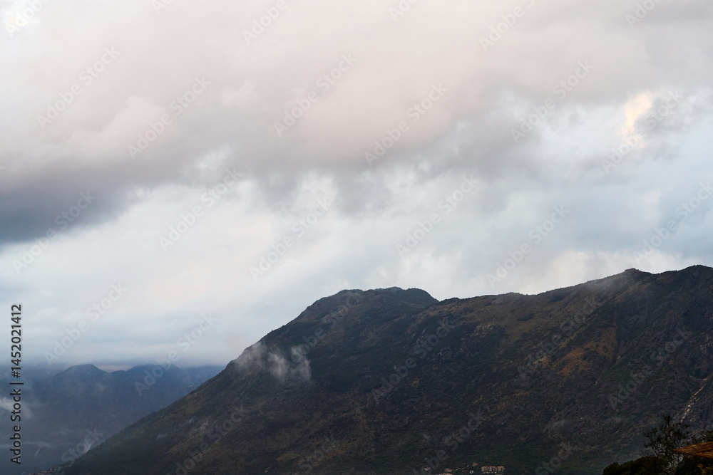 Rugged mountains reflecting on Kotor Bay waters