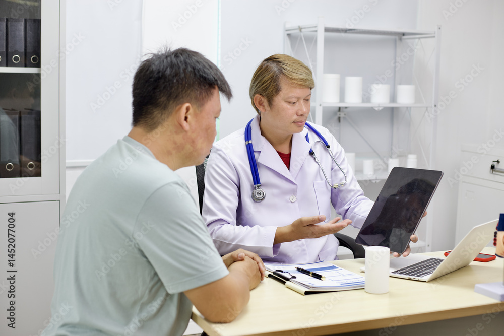 Doctor discusses medical results with patient in clinical setting Doctor discusses medical results with patient in clinical setting